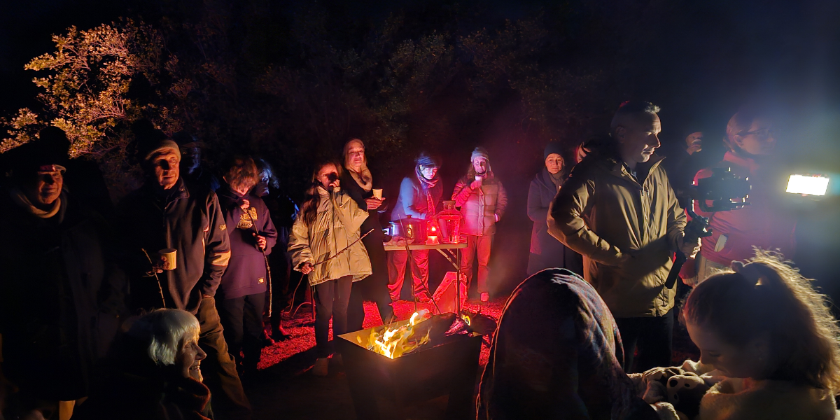 Community Gathering Under The Night Sky